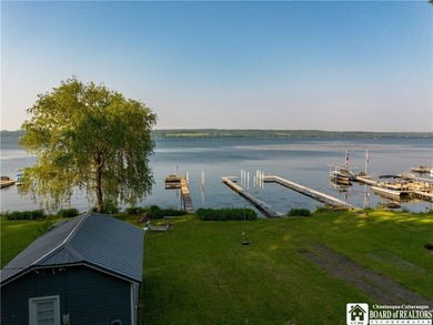 Welcome to 4896 Ashville Bay Road, a rare lakefront retreat on - photo 2