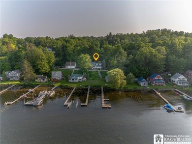 Welcome to 4896 Ashville Bay Road, a rare lakefront retreat on - photo 4