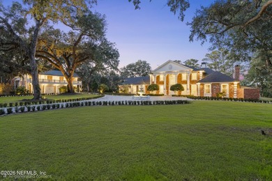 A rare, privately gated residence set on nearly 5 acres in - photo 2