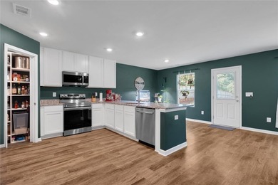 Built in 2023, this nearly new single-story home offers a - photo 13