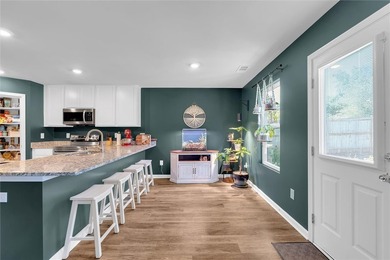 Built in 2023, this nearly new single-story home offers a - photo 17