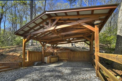 Situated on 1.9 private acres, this furnished mountain home - photo 3
