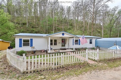Situated on two acres in rural Milton, this 1996 double-wide - photo 23