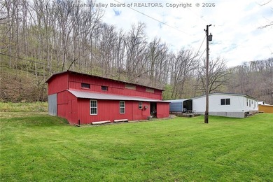 Situated on two acres in rural Milton, this 1996 double-wide - photo 26