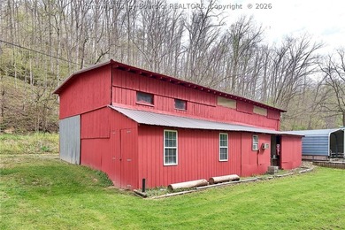 Situated on two acres in rural Milton, this 1996 double-wide - photo 28