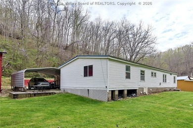 Situated on two acres in rural Milton, this 1996 double-wide - photo 29