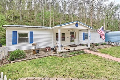Situated on two acres in rural Milton, this 1996 double-wide - photo 32