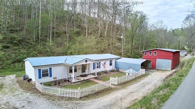 Situated on two acres in rural Milton, this 1996 double-wide - photo 33