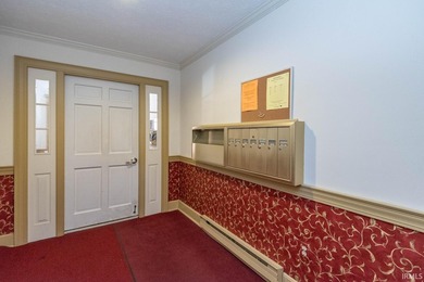 Located in the highly sought-after Woodcrest Court condominium