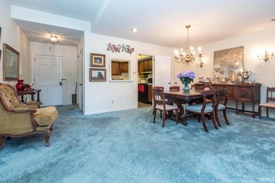 Located in the highly sought-after Woodcrest Court condominium