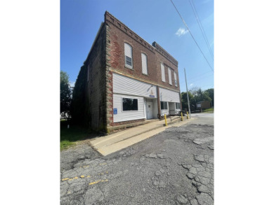 Retail/Mixed Use building on Main Street in Larwill! Building is