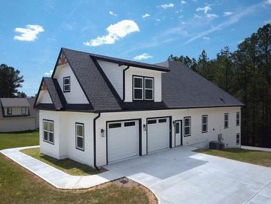 STUNNING new construction in the beautiful gated community of - photo 2