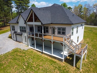 STUNNING new construction in the beautiful gated community of - photo 3