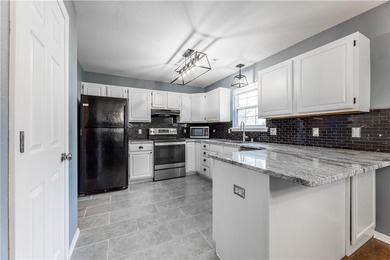 Tucked beneath a mature hardwood canopy in an established - photo 13