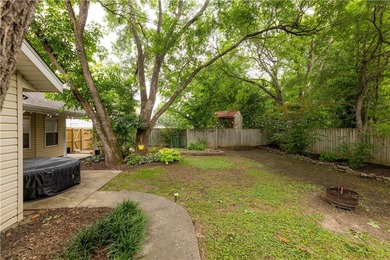 Tucked beneath a mature hardwood canopy in an established - photo 29
