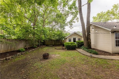 Tucked beneath a mature hardwood canopy in an established - photo 30