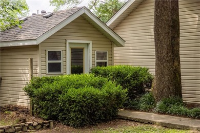 Tucked beneath a mature hardwood canopy in an established - photo 31