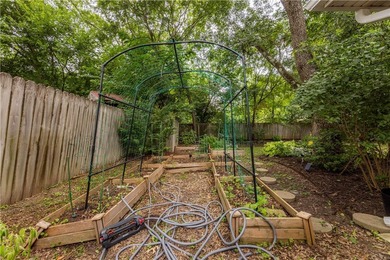 Tucked beneath a mature hardwood canopy in an established - photo 32