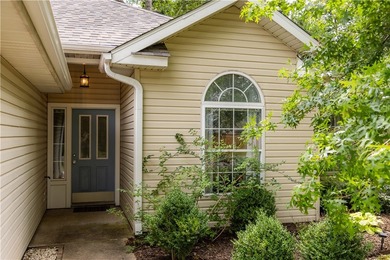 Tucked beneath a mature hardwood canopy in an established - photo 38