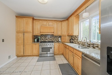 Welcome to this spacious Center Hall Colonial nestled in a - photo 15