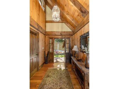 Set along the banks of the Horsepasture River, this exceptional - photo 14