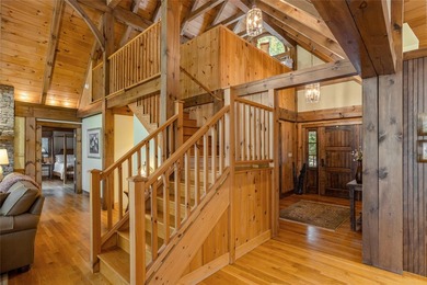 Set along the banks of the Horsepasture River, this exceptional - photo 16