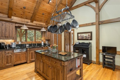 Set along the banks of the Horsepasture River, this exceptional - photo 27