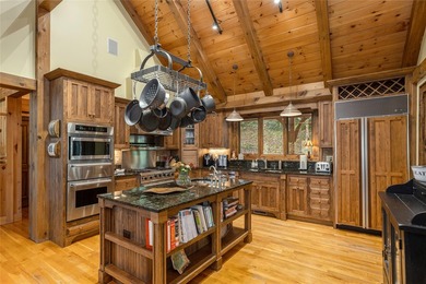 Set along the banks of the Horsepasture River, this exceptional - photo 28