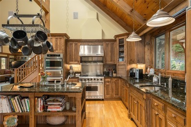 Set along the banks of the Horsepasture River, this exceptional - photo 29