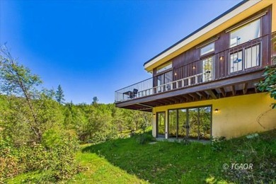 Perched atop 160 acres in the rugged beauty of Douglas City in - photo 36