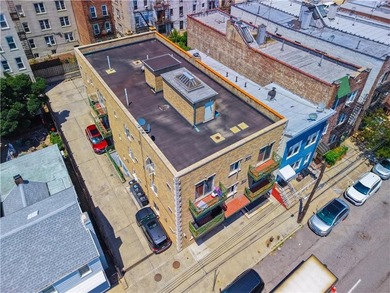 Rare opportunity to own a one-of-a-kind 8-family building in - photo 41