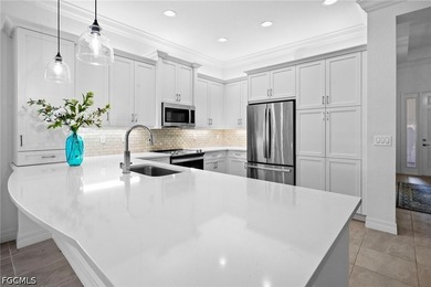 Experience refined living in this Cayman model located in Marina - photo 1