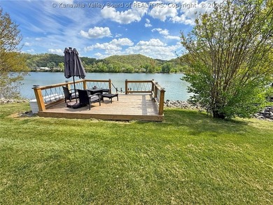 Welcome to riverfront living at its finest, where luxury - photo 13