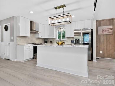 Beautiful mid-century modern nestled on the golf course in the - photo 15