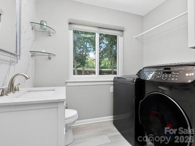 Beautiful mid-century modern nestled on the golf course in the - photo 22