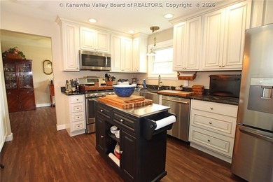 Welcome to riverfront living at its finest, where luxury - photo 22
