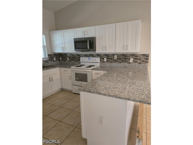 Beautifully maintained duplex on a corner lot, New Kitchen - photo 4
