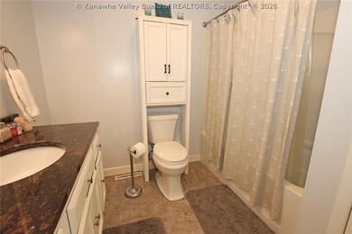 Welcome to riverfront living at its finest, where luxury - photo 35