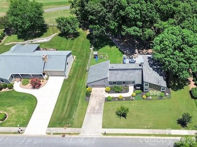 Beautiful mid-century modern nestled on the golf course in the - photo 47