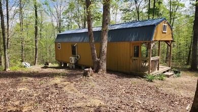 Discover your private escape on 10.94 +/- wooded acres close to - photo 9