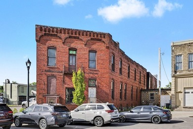 Rare investment opportunity in historic downtown Allegan! Built - photo 6