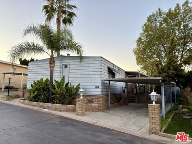 Spacious and rare 4-bedroom, 2-bath double-wide located in the - photo 1