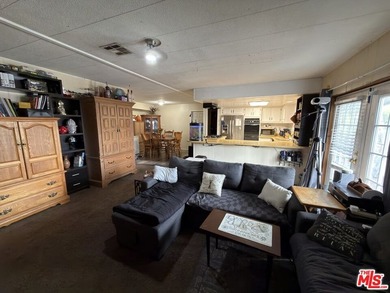 Spacious and rare 4-bedroom, 2-bath double-wide located in the - photo 3