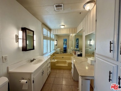 Spacious and rare 4-bedroom, 2-bath double-wide located in the - photo 8