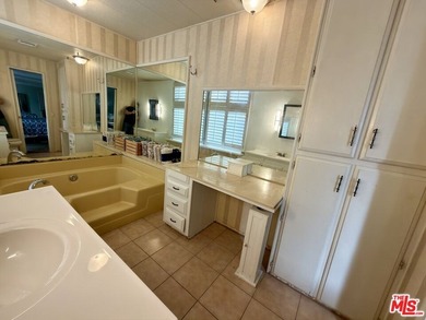 Spacious and rare 4-bedroom, 2-bath double-wide located in the - photo 9