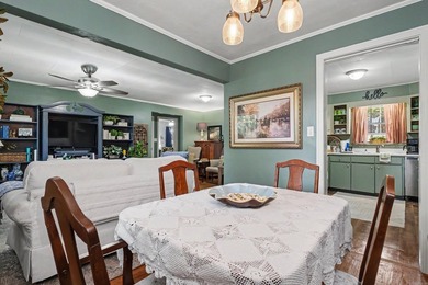 Nestled in the heart of Park Hill, this inviting home offers the - photo 3