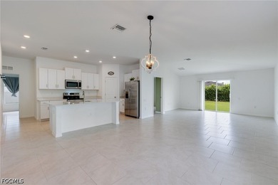 Beautifully maintained like-new home built in 2023 in the - photo 3