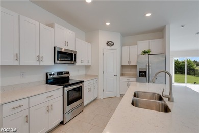 Beautifully maintained like-new home built in 2023 in the - photo 8