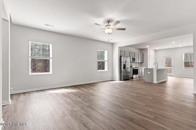 New construction and move-in ready! The Givens plan is a - photo 11