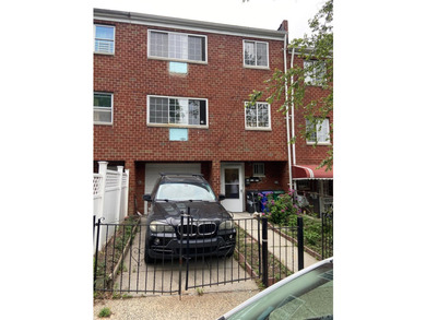 Baychester Area Updated 2 Family Brick attached Home with a - photo 1